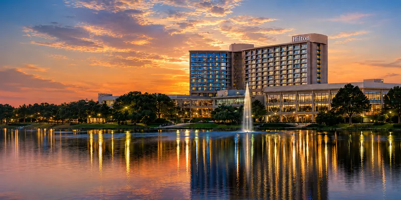 Hilton DFW Lakes Executive Conference Center at dusk, overlooking the lake